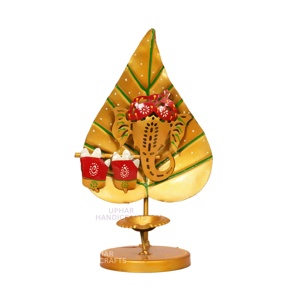Ganesh Metal Diya Holder
Hand Painted Festival Decor
Pan Patta Leaf Shaped Backdrop
Pooja Thali and Center Table Decor
Indian Spiritual Gift for Diwali
Uphar Handicrafts
