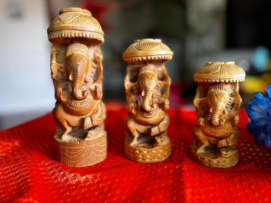 Hand Carved Ganesha with Umbrella Wooden Idol