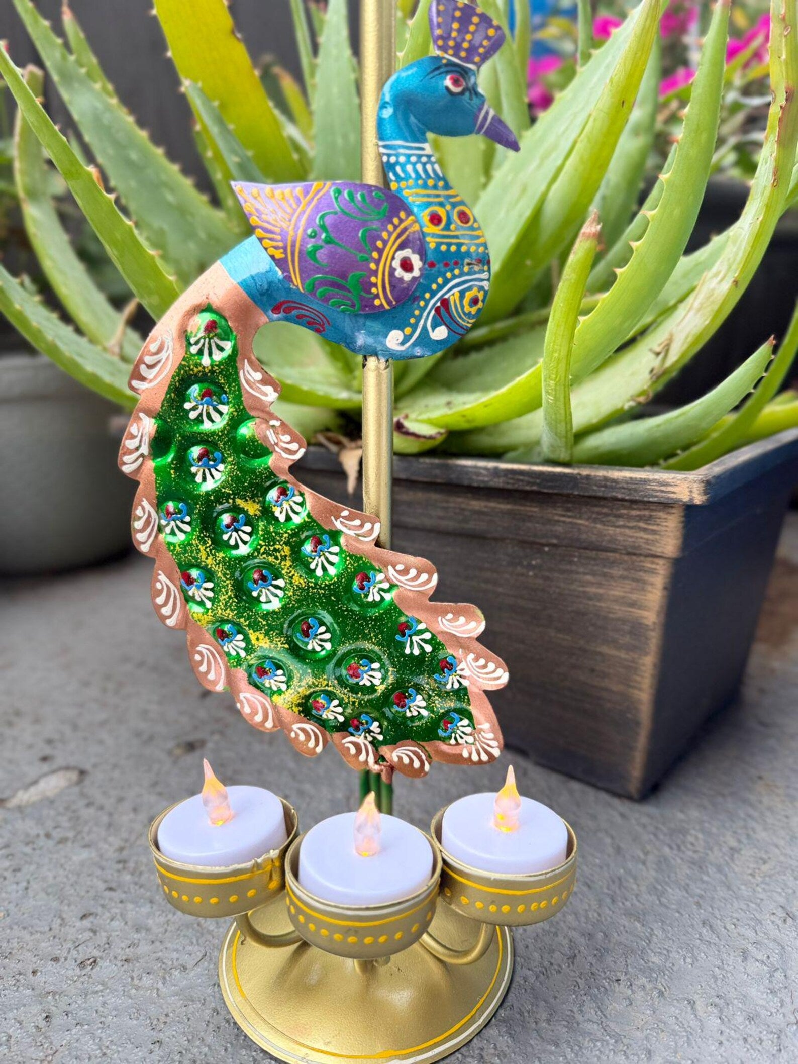Indian Peacock Home Decor
Handpainted Peacock Candle Holder
Colorful Peacock Candle Holder
Peacock Metal Tealight Holder
Uphar Handicrafts