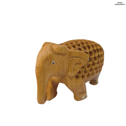 Carved Wooden Elephant Home Decor
Handcrafted Elephant with Baby
Open Lattice Jali Carving
Smooth Brown Natural Wood Finish
Indian Handmade Decorative Figurine
Living Room and Office Accent
Uphar Handicrafts