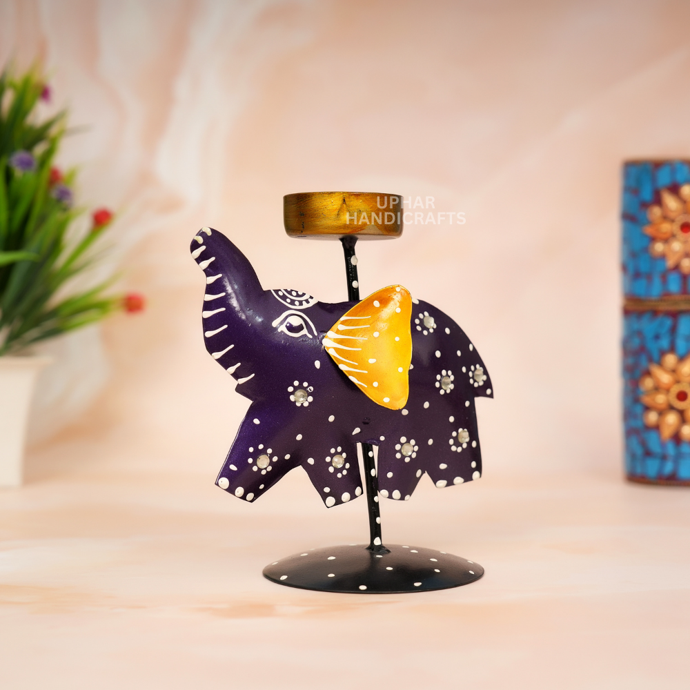 Black Gold Elephant Tealight Holder
Hand-Painted Metal Elephant Decor
Traditional Indian Candle Holder
Purple Black and Golden Detailing
Living Room and Dining Table Decor
Diwali and Housewarming Gift
Uphar Handicrafts
