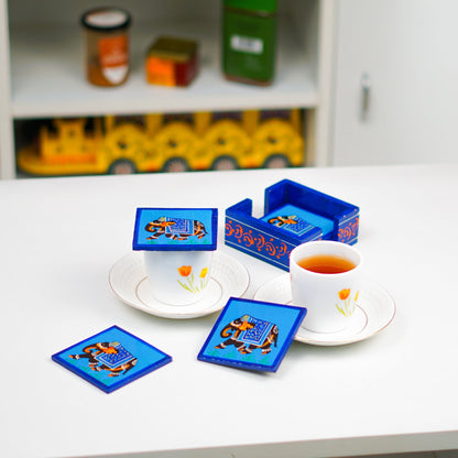 Blue Elephant Wooden Coaster
Hand-Painted Traditional Indian Elephant Design
Vibrant Blue Wooden Table Coaster
Handcrafted Indian Folk Art Decor
Cup Mug and Glass Table Protector
Tea Time and Table Styling Accent
Uphar Handicrafts