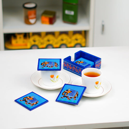 Blue Elephant Wooden Coaster
Hand-Painted Traditional Indian Elephant Design
Vibrant Blue Wooden Table Coaster
Handcrafted Indian Folk Art Decor
Cup Mug and Glass Table Protector
Tea Time and Table Styling Accent
Uphar Handicrafts