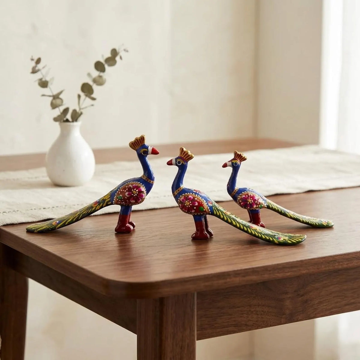 Three hand-painted peacock
Peacock Figurines
Beautifully Sculptured
Uphar Handicrafts
