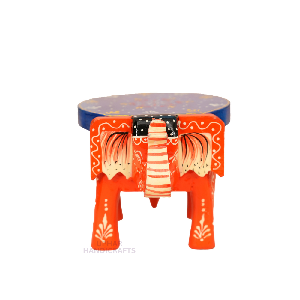 Blue Orange Indian Wooden Stool
Colorful Hand-Painted Elephant Artwork
Traditional Indian Artisan Craft
5x4x7 Inch Compact Decorative Stool
Spiritual and Boho Home Decoration
Tabletop Plant Stand and Gift Idea
Uphar Handicrafts