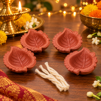 Diwali clay diyas with cotton wicks
Traditional Indian festive lighting
Set of four terracotta diyas
Handmade and hand-finished diyas
Diwali and Dhanteras decoration
Uphar Handicrafts