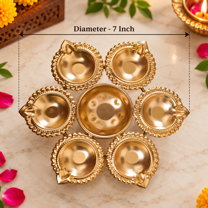 Diwali flower shaped diya holder
Brass festive candle and tealight decor
Six diya cups with center Urli bowl
Hand-finished traditional Indian design
Decorative Diwali tabletop accent
Uphar Handicrafts