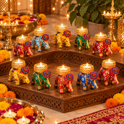 Elephant candle holder Indian decor
Handcrafted and hand-finished holder
Fabric covered frame with metal cup
Colorful floral painted elephant
Traditional festive home decoration
Uphar Handicrafts