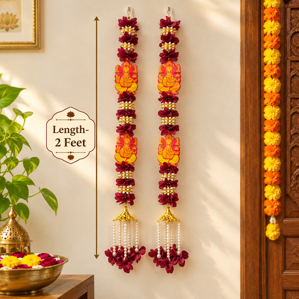 Ganesh flower garland hanging decor
Fabric flowers with Ganesh motifs
Layered flowers with bead detailing
Gold tone metal bell tassels
Two-foot vertical hanging garland
Traditional festive Indian-inspired decor
Uphar Handicrafts