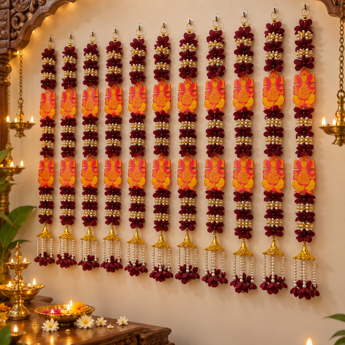 Ganesh hanging flower garland set
Fabric flowers with Ganesh motifs
Pearl style beads and gold tone bells
Vertical hanging strands with layered flowers
Handcrafted and hand-finished design
Traditional Indian-inspired festive decor
Uphar Handicrafts