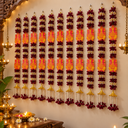 Ganesh hanging flower garland set
Fabric flowers with Ganesh motifs
Pearl style beads and gold tone bells
Vertical hanging strands with layered flowers
Handcrafted and hand-finished design
Traditional Indian-inspired festive decor
Uphar Handicrafts
