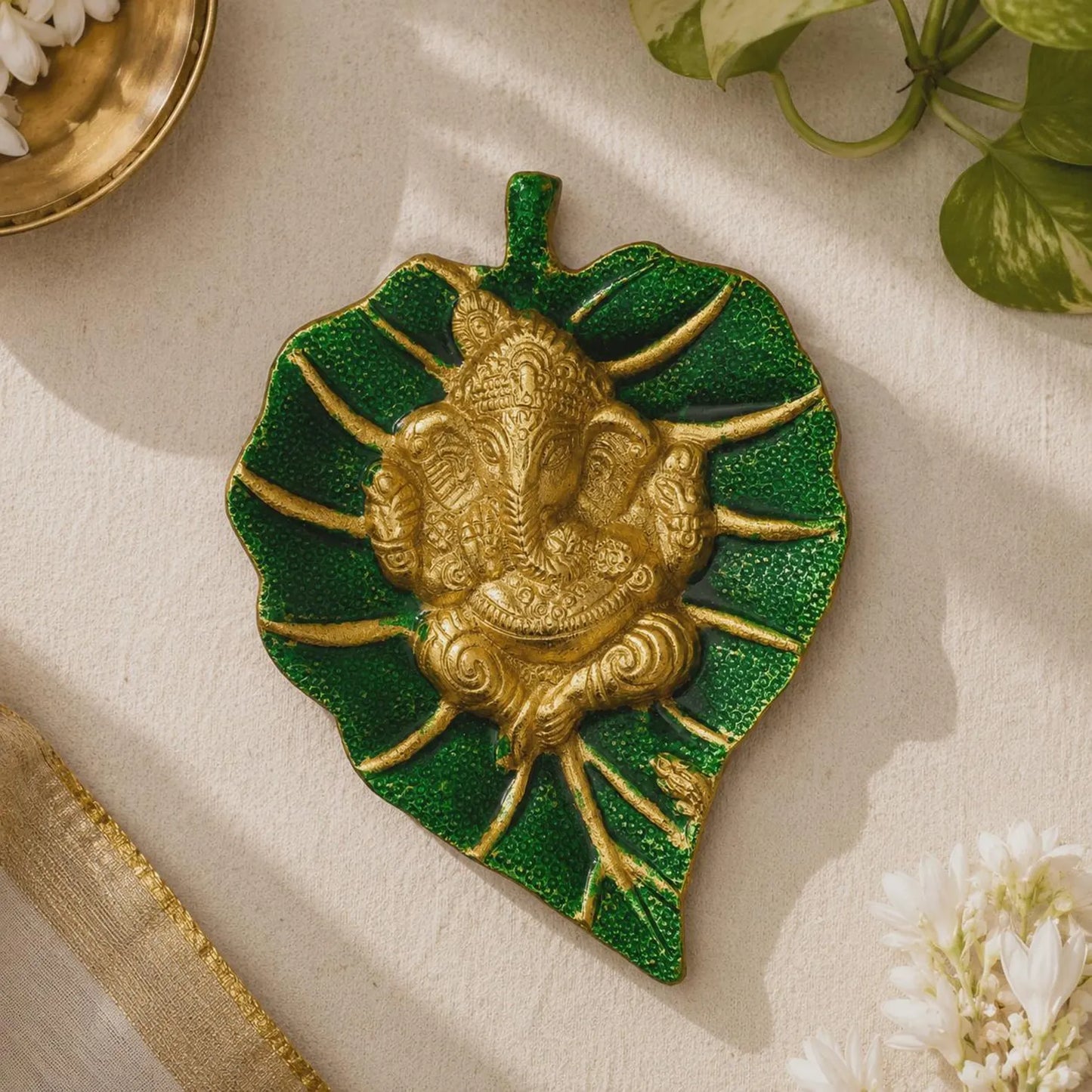 Ganesh Ji Leaf Wall Decor
Indian Entrance Wall Hanging
Handcrafted Metal Artwork
Traditional Ganesh Ji Design
Indian Spiritual Home Accent
Uphar Handicrafts