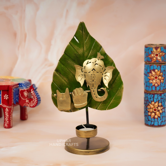 Ganesh Ji Pan Patta Tealight Holder
Antique Green Metal Diya Stand
Leaf Shaped Traditional Indian Decor
Ganesh Ji Pooja Tea Light Holder
Diwali and Ganesh Chaturthi Decoration
Spiritual Housewarming Gift
Uphar Handicrafts
