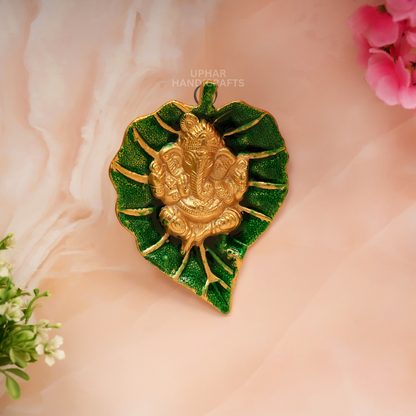 Ganesh Patta Metal Pooja Wall Decor
Green Leaf with Golden Ganesha
Traditional Indian Spiritual Accent
Compact 7x5 Inch Wall Decoration
Home Office and Entrance Decor
Uphar Handicrafts