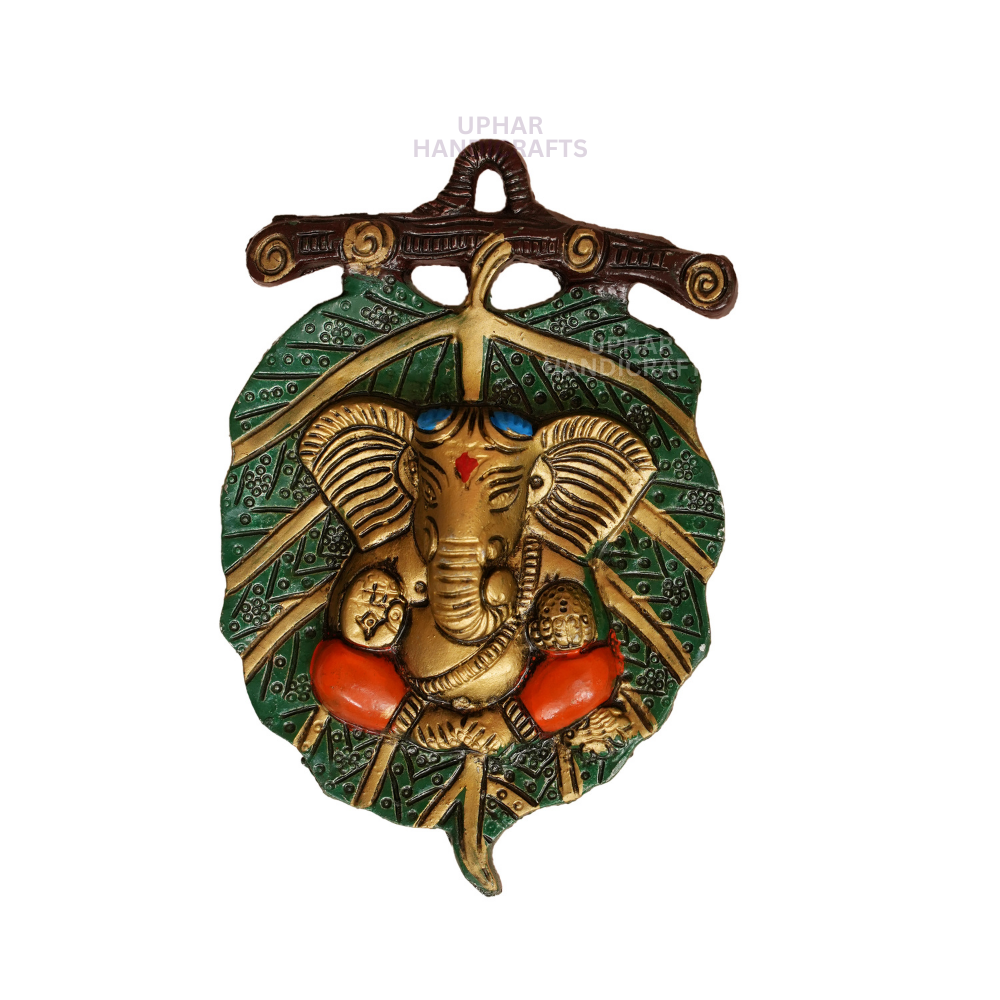 Ganesh Sacred Leaf Pooja Wall Art
Green and Golden Ganesha Design
Traditional Indian Metal Wall Decor
Mandir and Meditation Corner Accent
Housewarming and Wedding Return Gift
Uphar Handicrafts