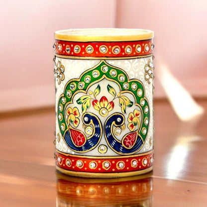 Gold Meenakari Mayur Marble Pen Stand
White Marble Decorative Pen Holder
Intricate Mayur Peacock Design
Traditional Indian Meenakari Artwork
Elegant Desk and Office Organizer
Tabletop Home Decor Accent
Uphar Handicrafts