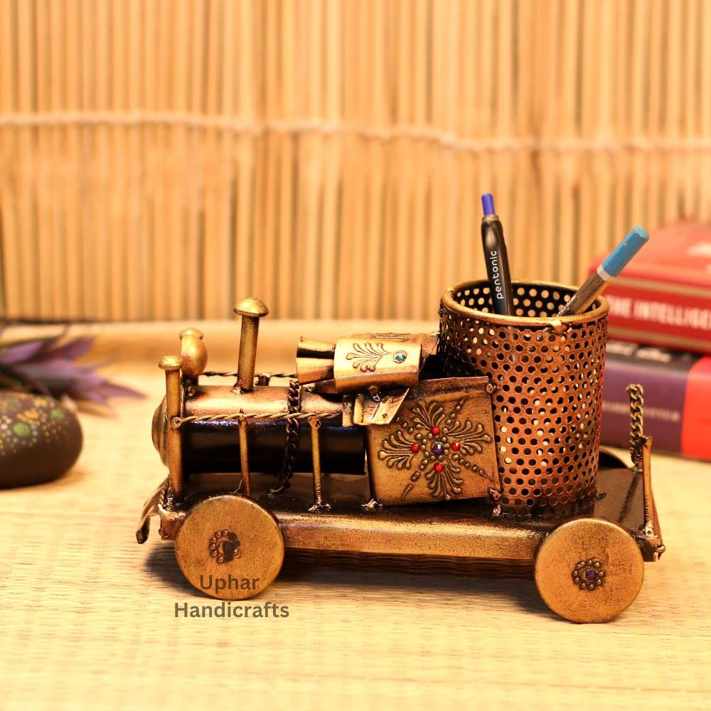 Golden Engine Design Desk Organizer
Antique Metal Decorative Pen Stand
Vintage Engine Inspired Showpiece
Compact Desk Decor
Pen Pencil Marker and Brush Holder
Stylish Home and Office Decoration
Uphar Handicrafts