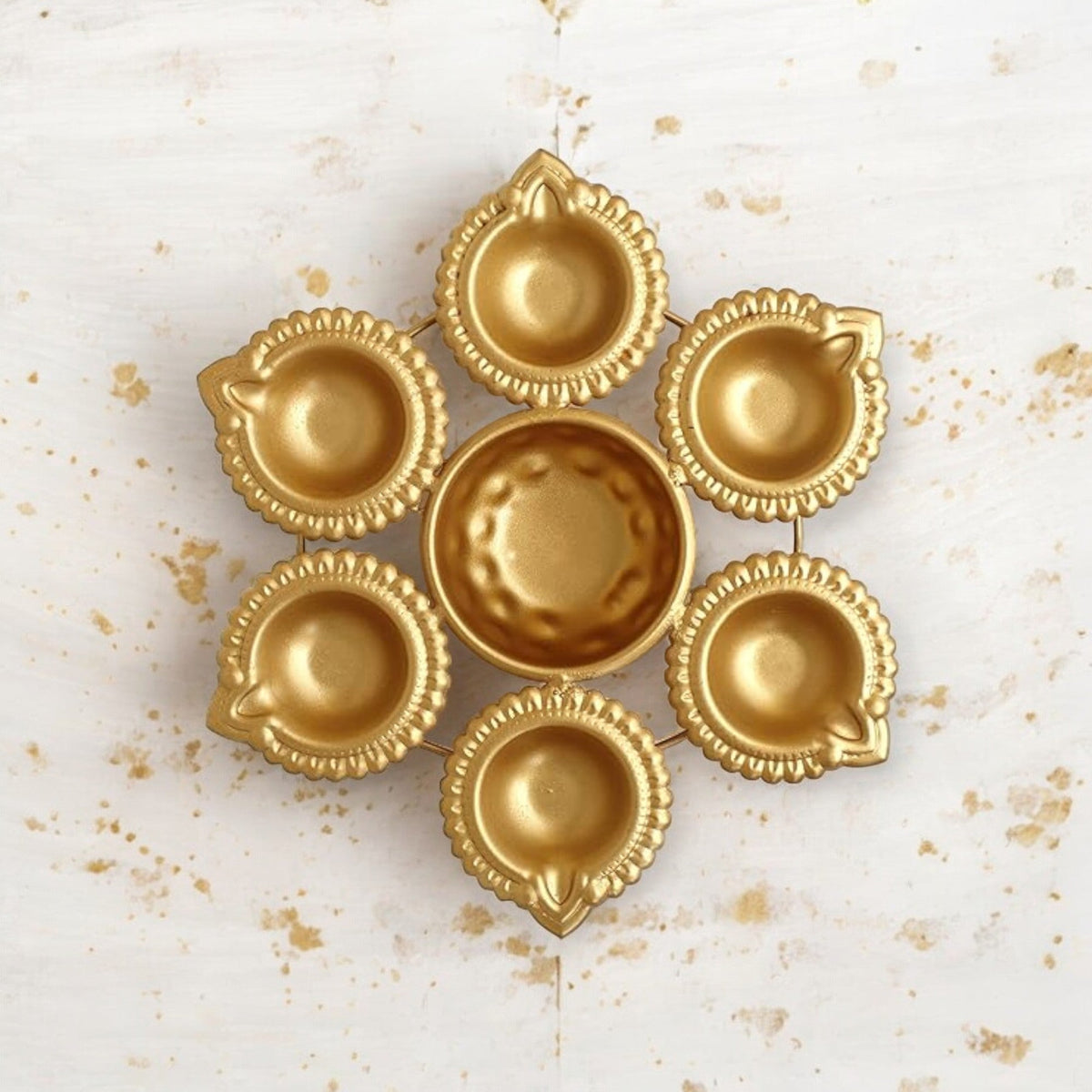 Golden Metal Diya Urli Bowl
Floral Indian Decorative Bowl Design
Premium Golden Metallic Finish
Tabletop Pooja Decor
Floating Candle and Potpourri Holder
Diwali Housewarming and Wedding Gift
Uphar Handicrafts