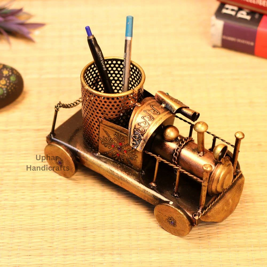 Golden Metal Engine Pen Stand
Antique Engine Shaped Desk Organizer
Durable Metal with Golden Finish
Decorative Pen Holder
Holds Pens Pencils Markers and Brushes
Vintage Home Office and Desk Decor
Uphar Handicrafts