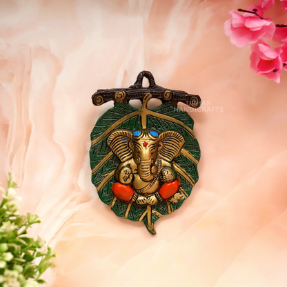 Green Gold Ganesh Leaf Wall Hanging
Lord Ganesh on Fig Leaf Design
Durable Metal Indian Spiritual Decor
Traditional Pooja Room Decoration
Diwali and Ganesh Chaturthi Gift
Uphar Handicrafts