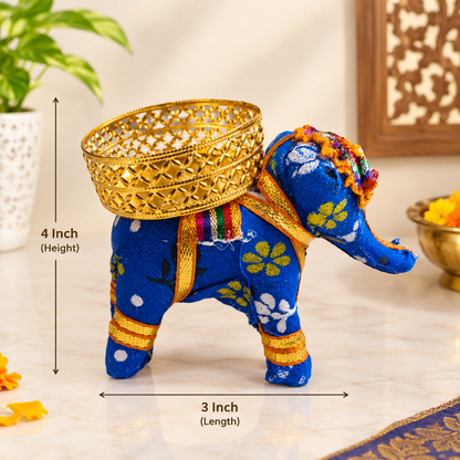 Hand-painted elephant tealight holder
Decorated elephant candle holder
Gold tone metal cut out tealight cup
Floral painted detailing
Traditional Indian home decor
Uphar Handicrafts