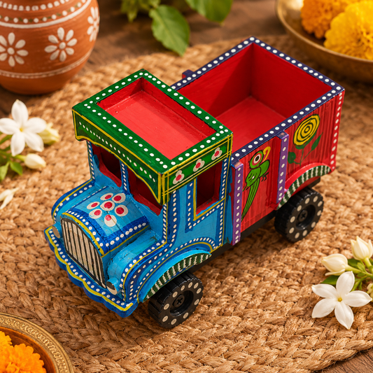 Hand-painted wooden Indian truck showpiece with multicolor folk art
Traditional Indian truck art featuring floral and bird motifs
Made from 100% natural wood with a colorful hand-painted finish
Decorative wooden truck measuring approximately 7 × 5 inches
Handmade Indian folk art accent for shelves, desks and mantels
Unique brushwork and painted patterns make each truck distinctive
Uphar Handicrafts