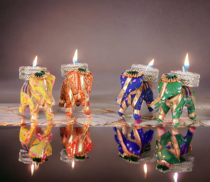 Handcrafted Fabric Elephant Candle Holder
Traditional Indian Elephant Decor
Colorful Fabric Decorative Design
Tealight Holder for Home Decoration
Tabletop and Shelf Candle Accent
Festive and Ethnic Home Decor
Uphar Handicrafts
