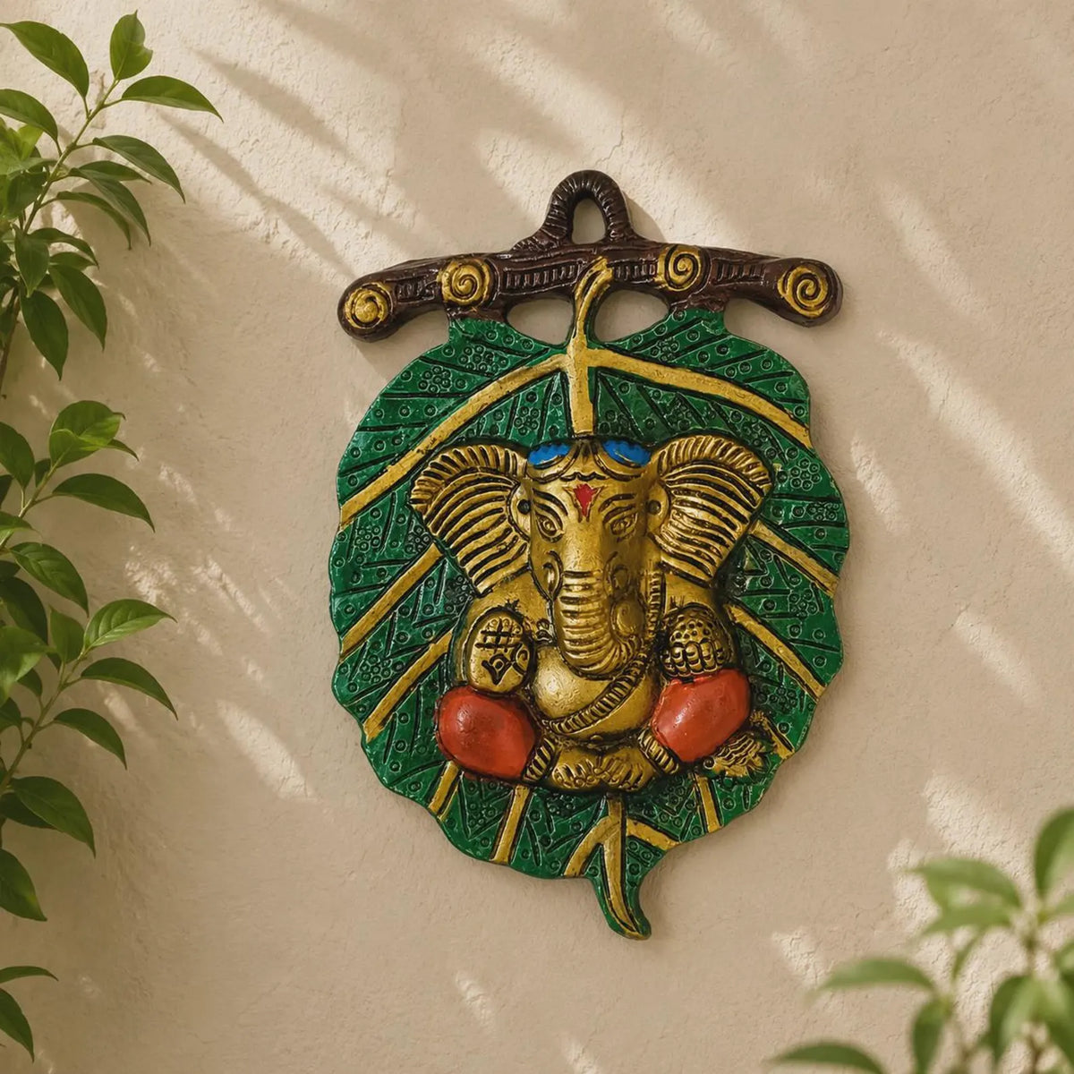 Indian Metal Ganesh Wall Art
Leaf Shape Wall Decoration
Handcrafted Hindu Decor
Traditional Indian Artwork
Spiritual Home Wall Hanging
Uphar Handicrafts