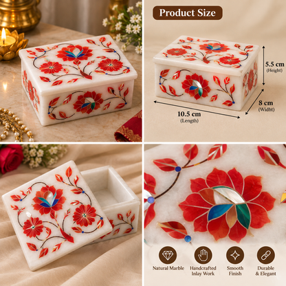 Handcrafted marble inlay box
Polished white marble construction
Floral stone inlay detailing
Decorative lid and rectangular shape
Traditional Indian-inspired craftsmanship
Box for jewelry and small accessories
Uphar Handicrafts