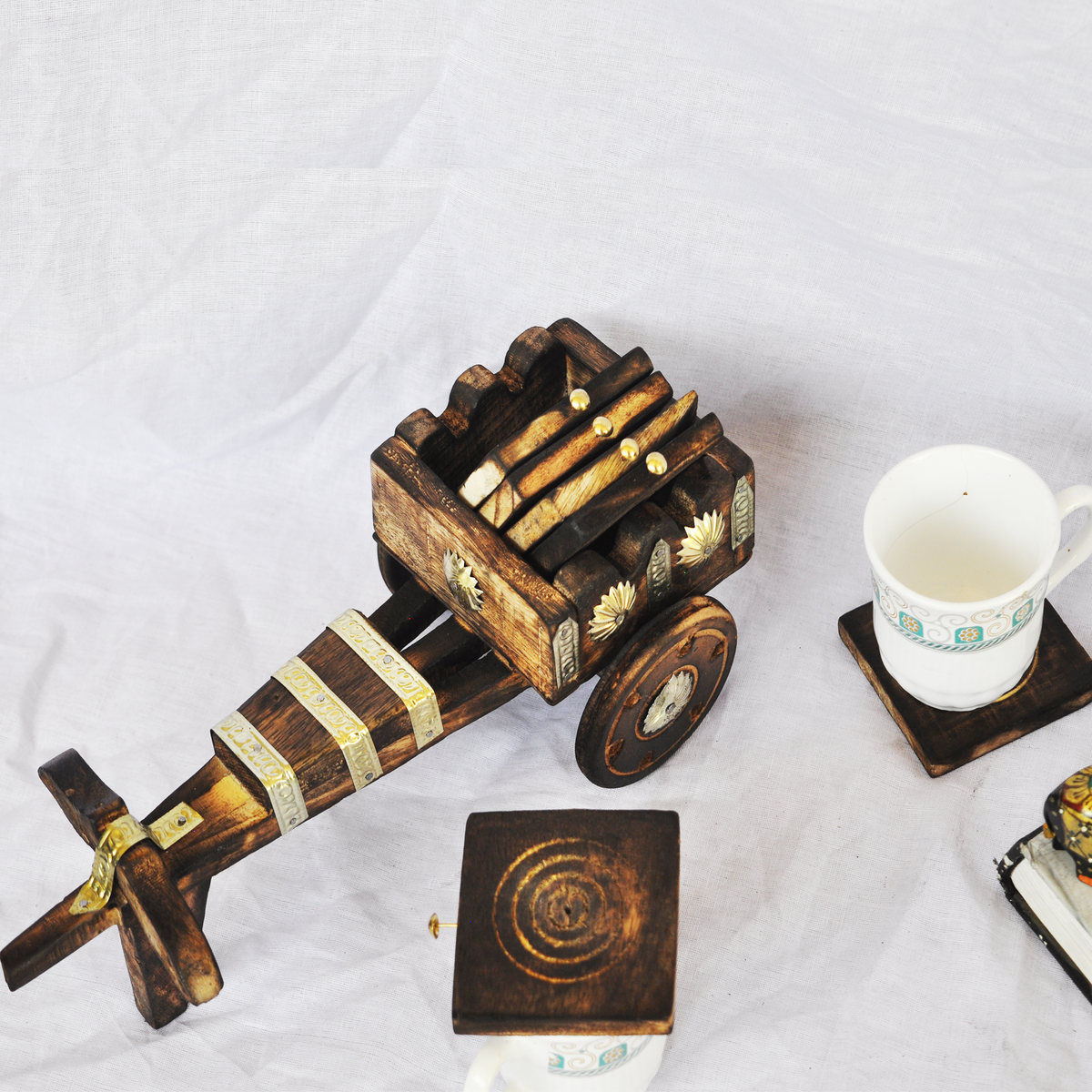 Handcrafted Wooden Bullock Cart Coasters
Set of 6 Indian Coasters
Traditional Bullock Cart Design
Sheesham Wood Table Coasters
Rustic Indian Home Decor
Uphar Handicrafts