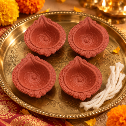 Handmade clay diyas for festive decor
Natural terracotta diya set
Four traditional Indian diyas
Cotton wicks included
Diwali and festival lighting
Uphar Handicrafts