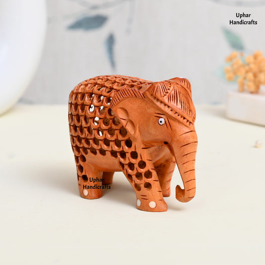 Handmade Wooden Elephant Undercut Statue
Brown White Wood Elephant Showpiece
5 Inch Hand-Carved Wooden Figurine
Intricate Undercut Wood Carving Design
Traditional Indian Artisan Craft
Tabletop Shelf and Home Decor
Uphar Handicrafts