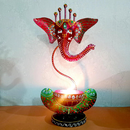 Hand Painted Ganesh Metal Diya
Iron Ganesh Tealight Holder
Black Green Indian Handicraft
Decorative Ganesh Lamp for Home
Diwali and Festival Pooja Decor
Uphar Handicrafts