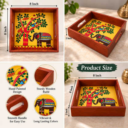 Hand-painted elephant and tree serving tray for festive occasions
Traditional Indian folk art on a square wooden tray
Polished wood frame with cut-out side handles
Approximately 8 × 8 inches with a 2-inch height
Suitable for serving sweets, dry fruits and snacks during Diwali
Handcrafted decorative tray for celebrations and gifting
Uphar Handicrafts