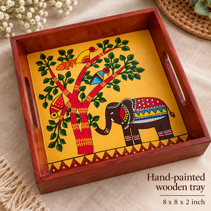 Indian folk art serving tray with hand-painted elephant and tree artwork
Square wooden tray with a polished frame and side handles
Traditional decorative design inspired by Indian craftsmanship
Handcrafted tray measuring 20.3 × 20.3 × 5.1 cm
Suitable for serving refreshments and displaying decorative items
Unique hand-painted details make every tray distinctive
Uphar Handicrafts
