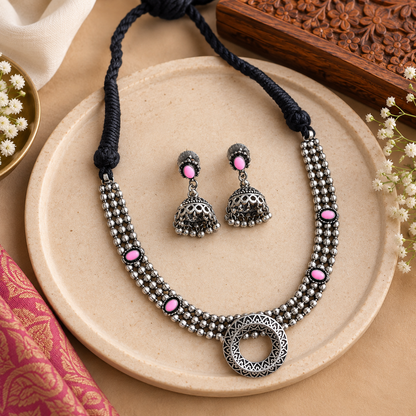 Indian oxidized necklace and matching earrings
Traditional handcrafted jewelry with antique look
Silver-tone metal alloy necklace design
Decorative stones and beads enhance the detailing
Adjustable black thread tie-back closure
Ethnic jewelry for festivals and traditional outfits
Uphar Handicrafts
