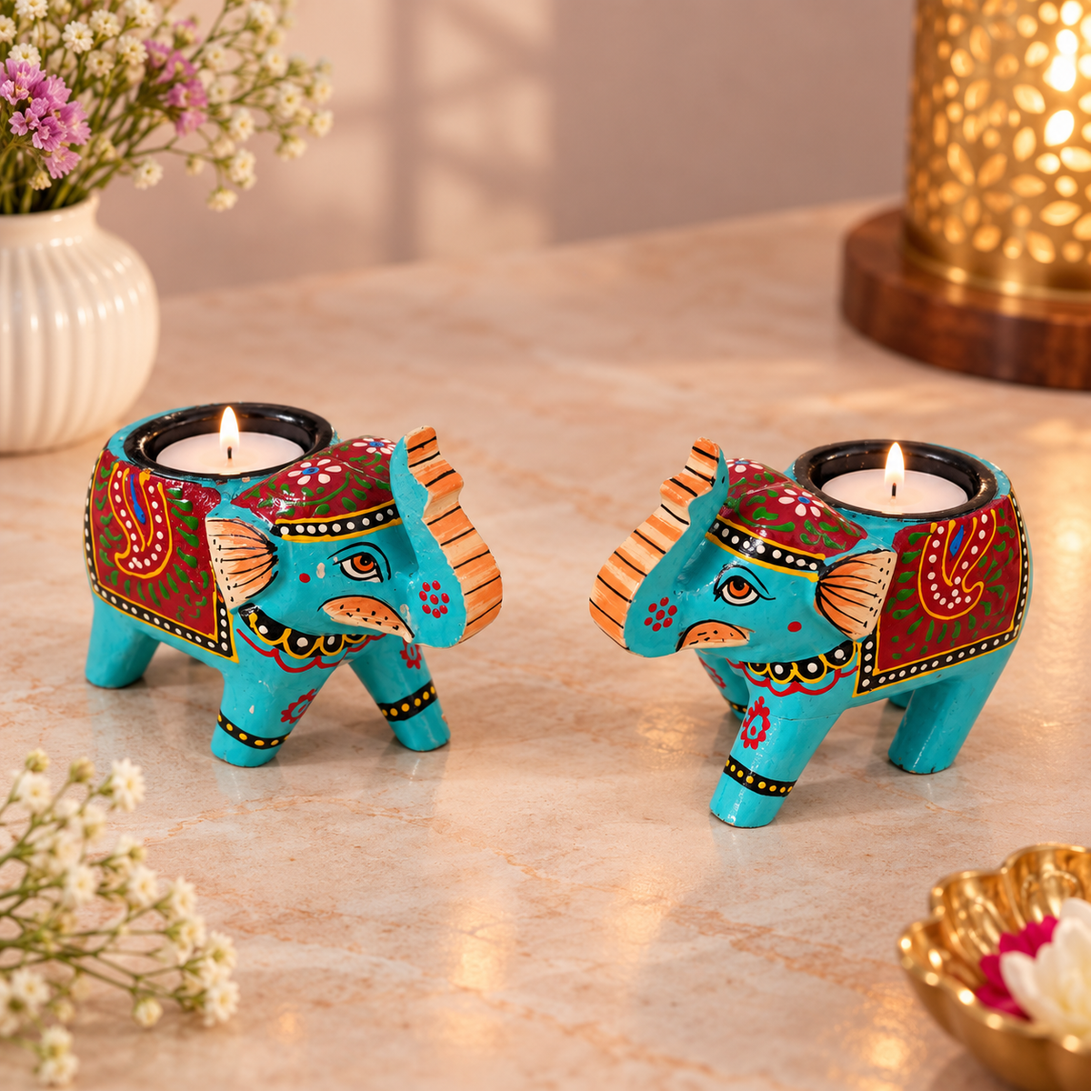 Indian-inspired wooden elephant candle holder
Hand-painted wooden tealight decor
Trunk-up elephant with back tealight cup
Traditional Rajasthani-style design
Festive table and puja shelf decor
Handcrafted elephant gift decor
Uphar Handicrafts