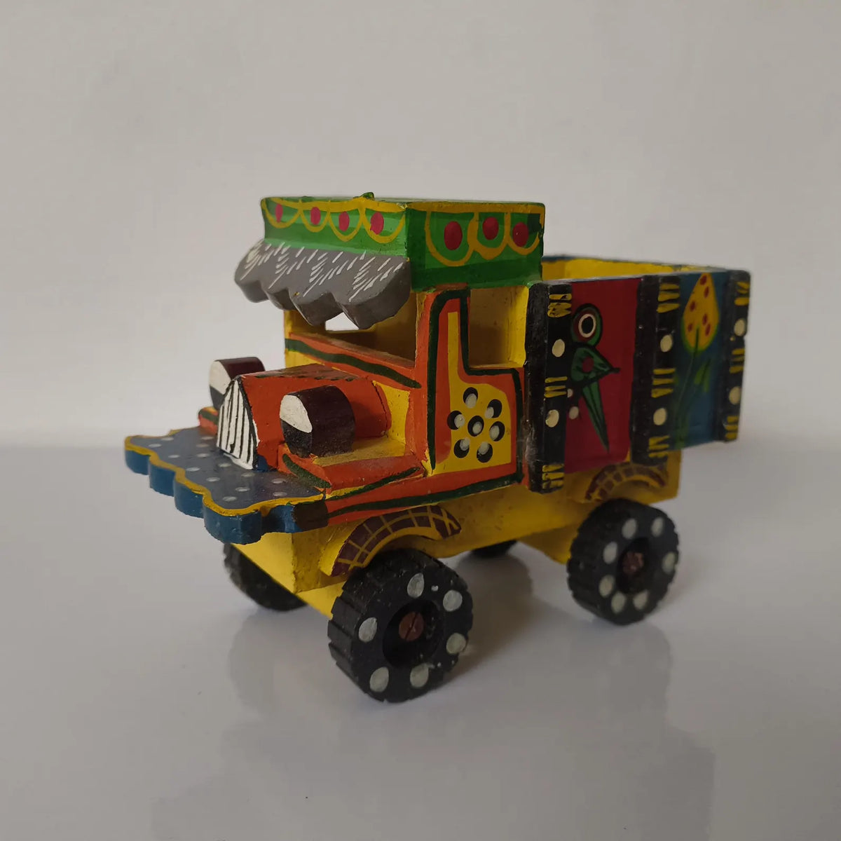 Rajasthani folk art
Wooden Indian showpiece
Indian home decor
Handmade Indian gift
Colorful folk art decor
uphar handicrafts