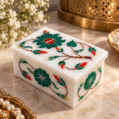 Marble cufflink and accessory box
Polished white marble storage box
Hand-inlaid floral design
Rectangular box with matching lid
Traditional Indian-inspired craftsmanship
Suitable for cufflinks and small accessories
Uphar Handicrafts