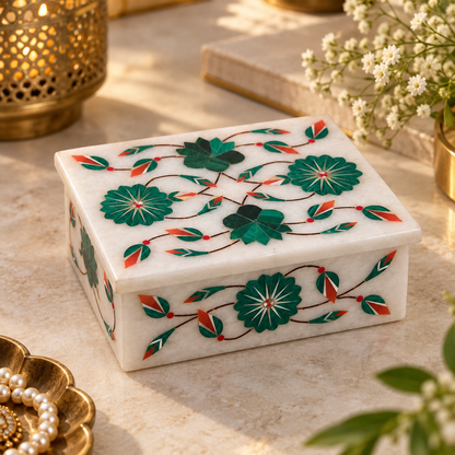 Marble inlay jewelry and trinket box
White marble box with matching lid
Hand-inlaid floral motifs
Polished marble finish
Traditional Mughal-inspired craftsmanship
Handcrafted Indian decorative storage box
Uphar Handicrafts