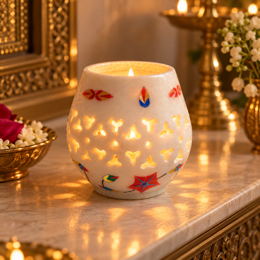 White marble tealight candle holder
Round holder with cut-out lattice pattern
Hand-inlaid floral motif border
Polished white marble finish
Fits one standard tealight candle
Traditional Mughal-inspired Indian decor
Uphar Handicrafts