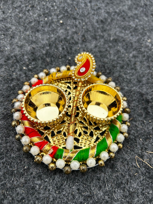 Multicolor Akshat Kumkum Puja Thali
Traditional Tikka and Kumkum Plate
Akshat Haldi and Chandan Holder
Festive Diwali and Wedding Puja Decor
Indian Religious Return Gift
Uphar Handicrafts