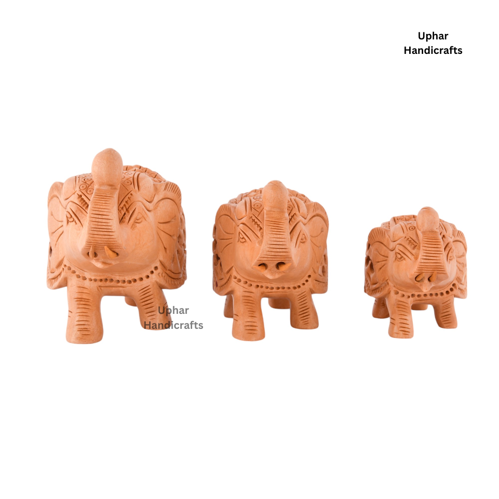 Natural Wood Elephant Showpiece Set
Set of 3 Handcrafted Indian Elephants
Traditional Rajasthani Jali Carving
Good Luck Housewarming and Diwali Gift
Ethnic Boho Home and Office Decoration
Uphar Handicrafts