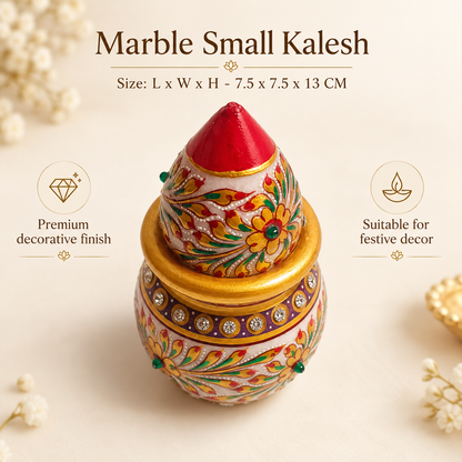 Peacock design marble Kalash for puja decoration
White marble body with colorful painted artwork
Gold-tone borders frame the decorative design
Stone embellishments enhance the traditional finish
Coconut-shaped top completes the Kalash silhouette
Indian-inspired accent for a home temple
Uphar Handicrafts
