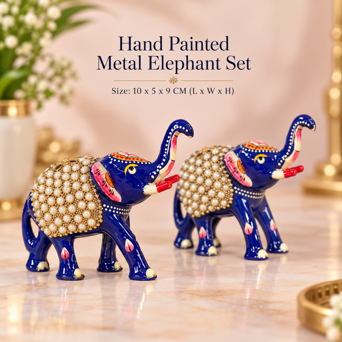 Blue metal elephant figurines embellished with pearl-style beads
Matching pair with raised trunks and hand-painted details
Glossy blue finish with contrasting red and white accents
Traditional decorative elephant set for festive home styling
Thoughtful gift for housewarmings, weddings and anniversaries
Handcrafted pair suitable for display cabinets and consoles
Uphar Handicrafts