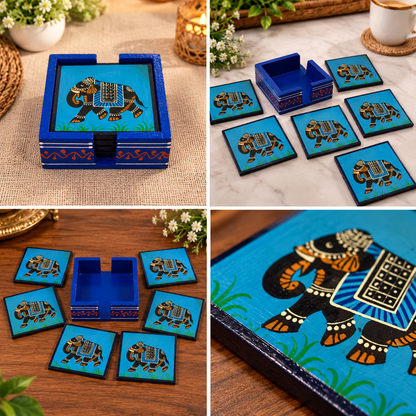 Rajasthani elephant coaster set with holder
Hand-painted wooden coaster design
Six square coasters with matching holder
Decorated elephant motif
Approximately 11 cm square coasters
Traditional Indian-inspired craftsmanship
Uphar Handicrafts