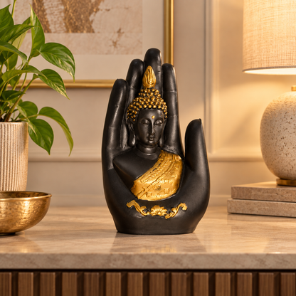 Decorative seated Buddha in black and gold tones
Buddha figure resting on a sculpted open palm
Gold-tone highlights on the hair and robe
Lotus border detail around the statue base
Handcrafted and hand-finished polyresin figurine
Suitable for entryways, desks and console tables
Uphar Handicrafts