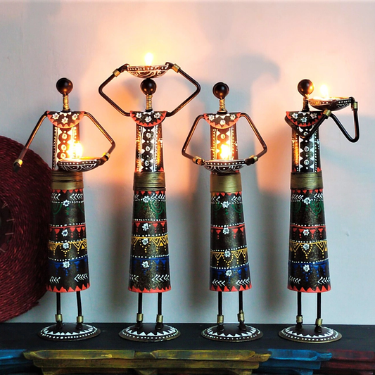 Set of 4 Iron Tribal Tealight Holders
Handcrafted Tribal Doll Candle Holder Design
Intricate Iron Figure Detailing
Bold Colored Decorative Candle Holders
Global Style Home Decor Accent
Tabletop and Festive Tealight Decoration
Uphar Handicrafts