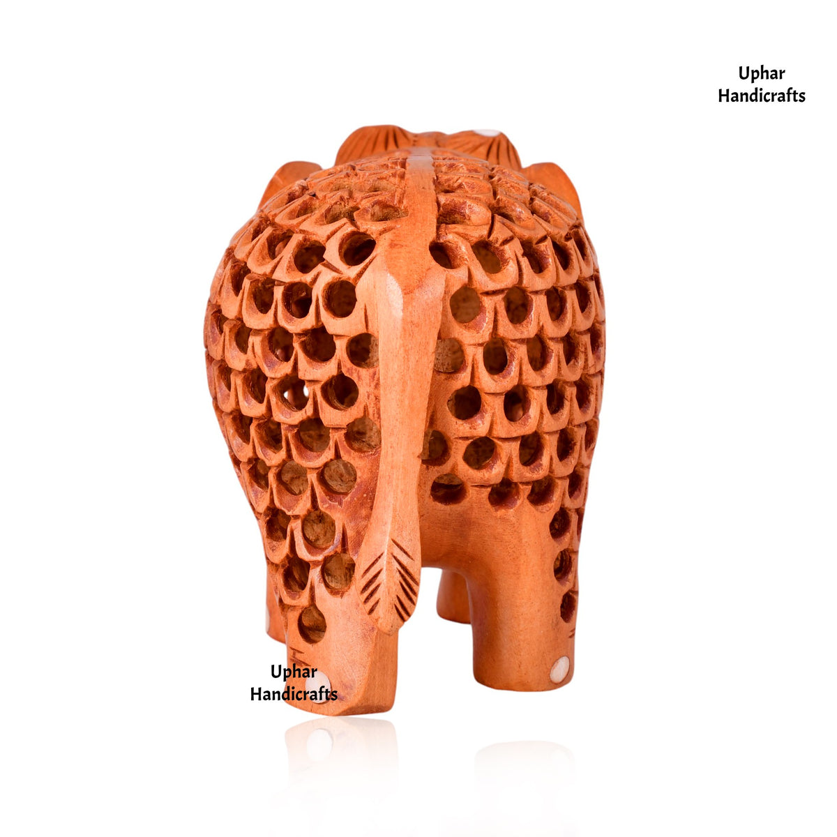 Traditional Handmade Wooden Elephant Decor
Brown White Wood Carved Elephant
5 Inch Handcrafted Statue Showpiece
Elaborate Undercut Carving Artwork
Indian Artisan Handmade Wood Craft
Ethnic Tabletop and Shelf Decoration
Uphar Handicrafts