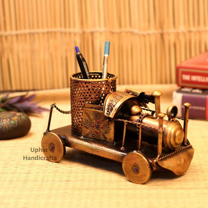 Vintage Golden Metal Engine Showpiece
Antique Engine Shaped Pen Stand
Durable Metal with Antique Finish
Functional Desk and Shelf Organizer
Pens Pencils Markers and Makeup Brushes
Unique Gift for Office and Collectors
Uphar Handicrafts